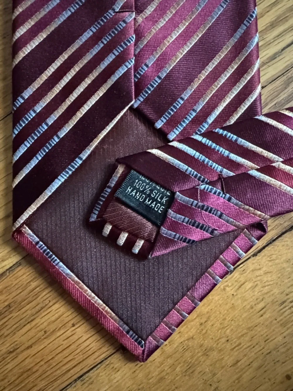 Stunning Oleg Cassini Burgundy Silk Tie with Silver and Light Blue Stripes